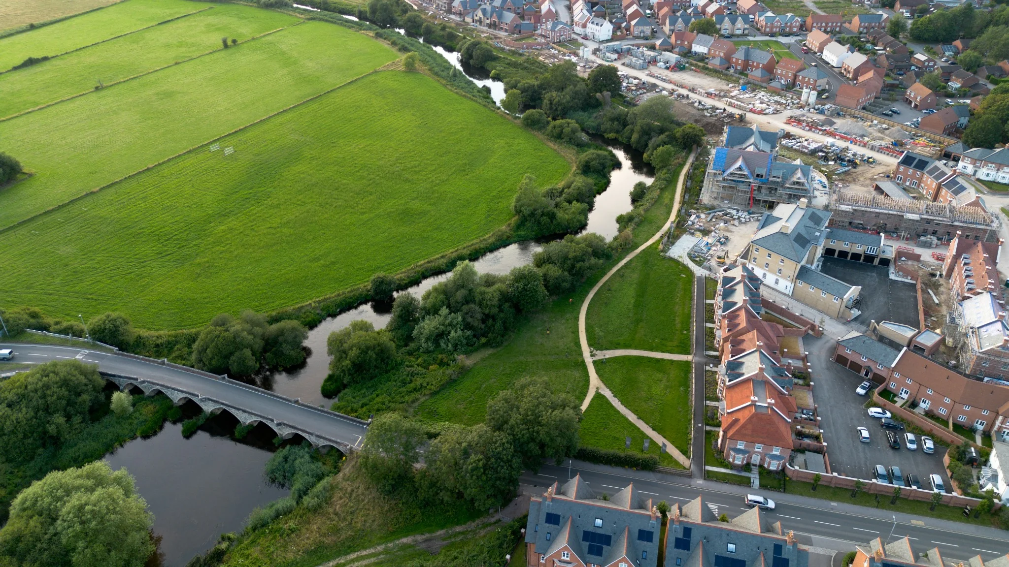 Aerial view of Green Belt land beside a town